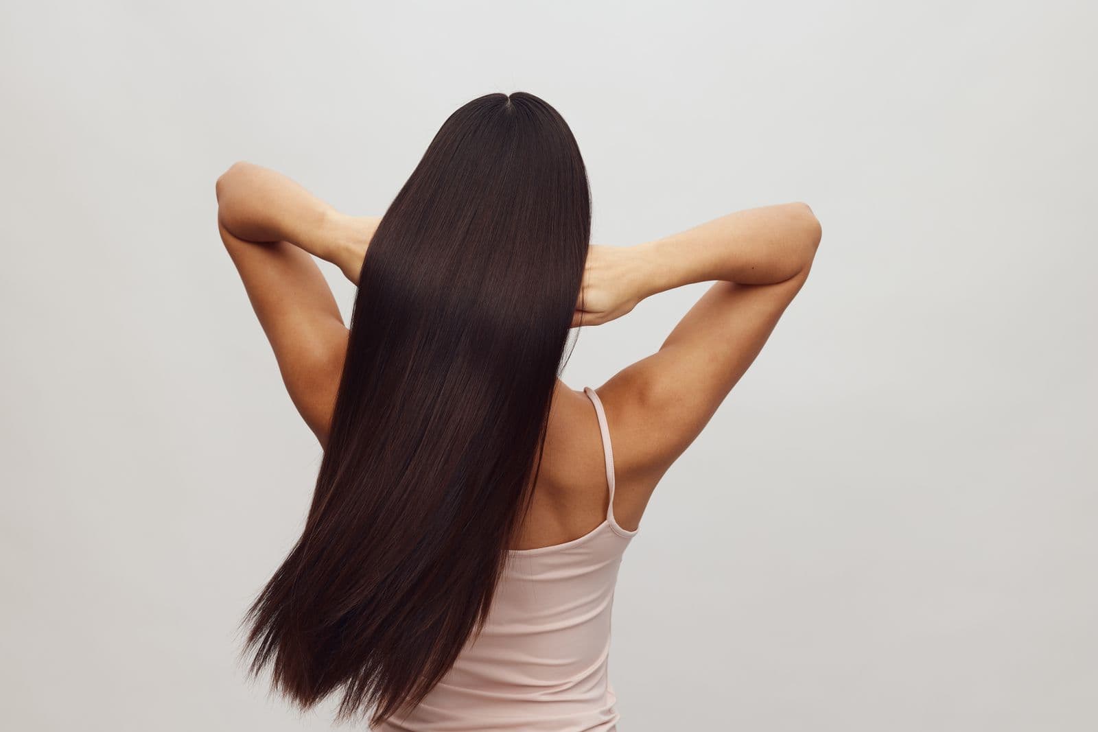 Sleek straight hair falling in a single clean line